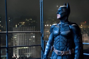 Christian Bale stars in Christopher Nolan's "The Dark Knight Rises," which predictably topped the box office this weekend in the wake of an unpredictable tragedy.