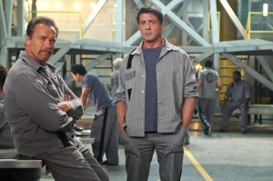 Arnold Schwarzenegger and Sylvester Stallone co-star in "Escape Plan," here reviewed by film critic James Frazier.